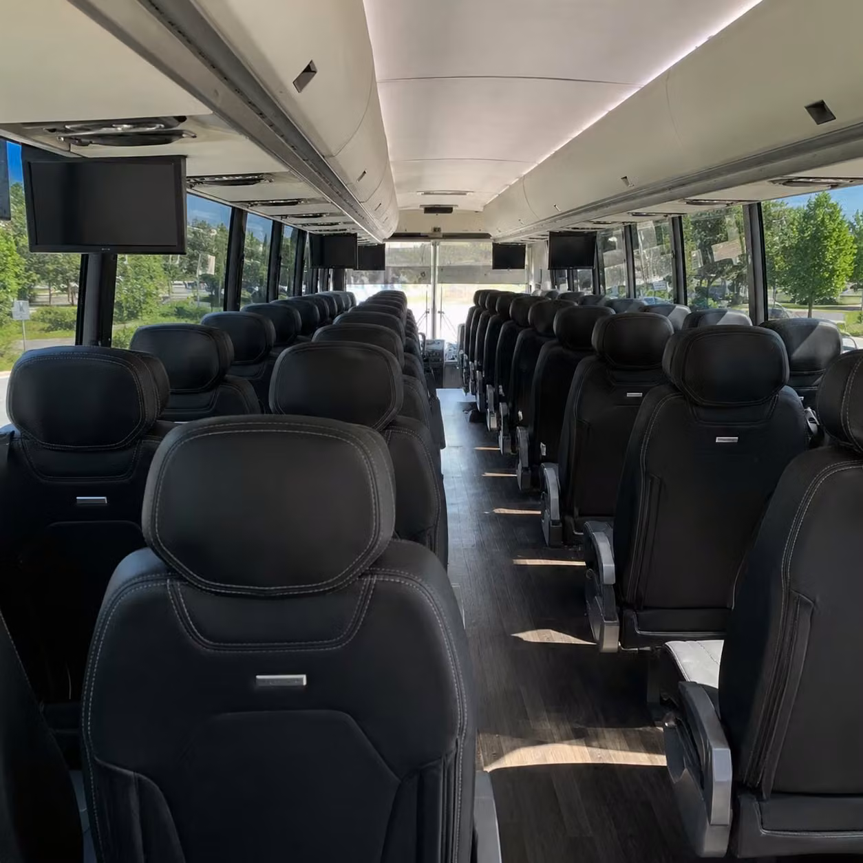how trip distance and duration affect charter bus rental rates in greensboro